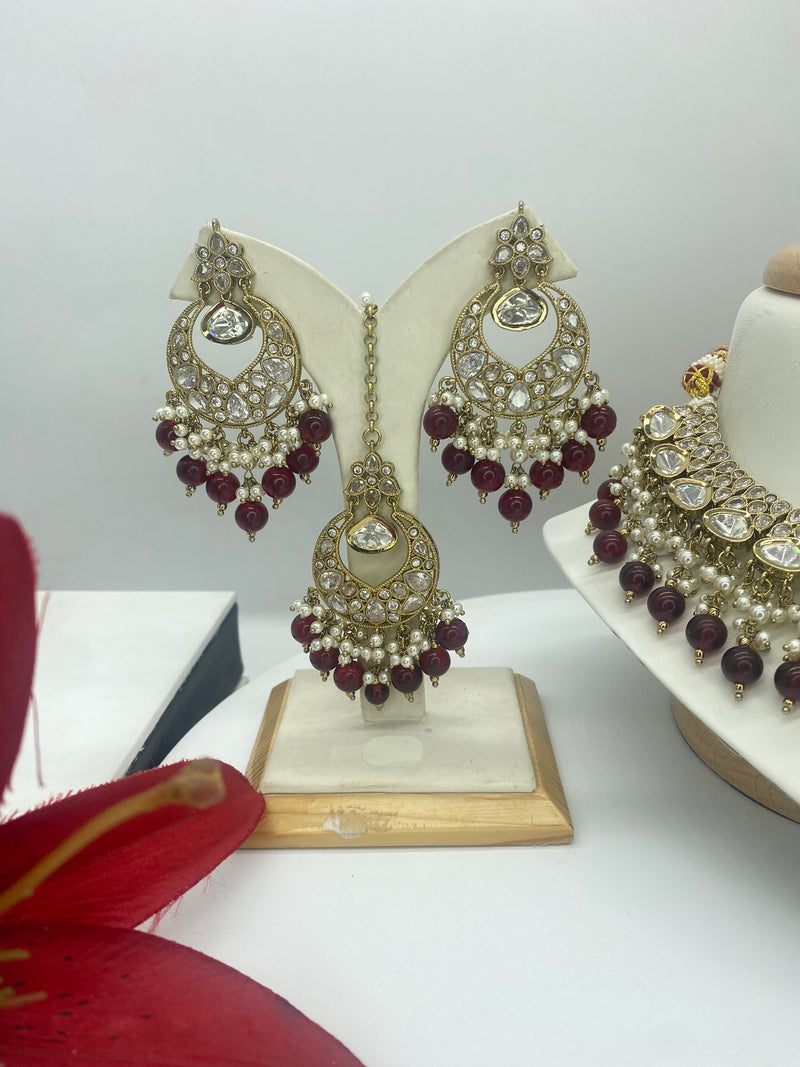 Kundan with a touch of Ruby Pearls