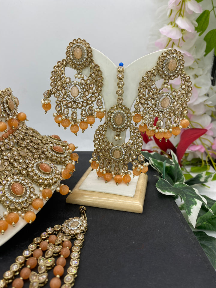 peach & gold - Sai Fashions (UK) Ltd.
