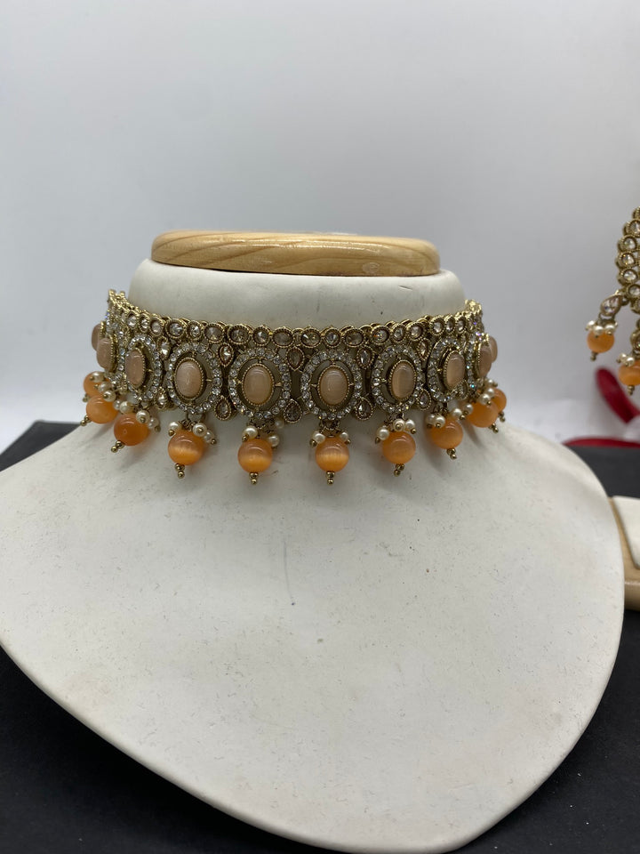 peach & gold - Sai Fashions (UK) Ltd.